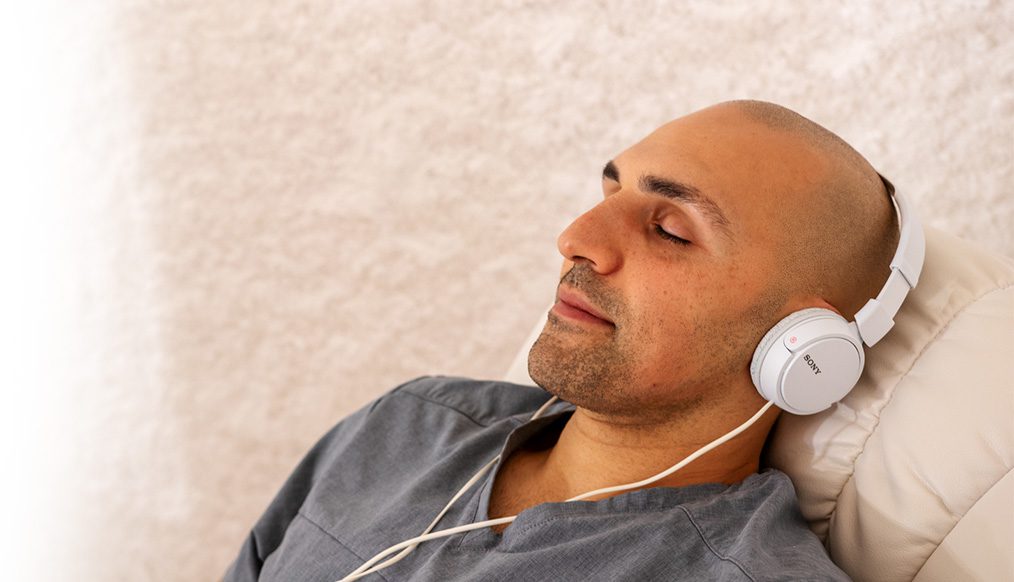 Close up of man resting as he breathes easy during a salt session.