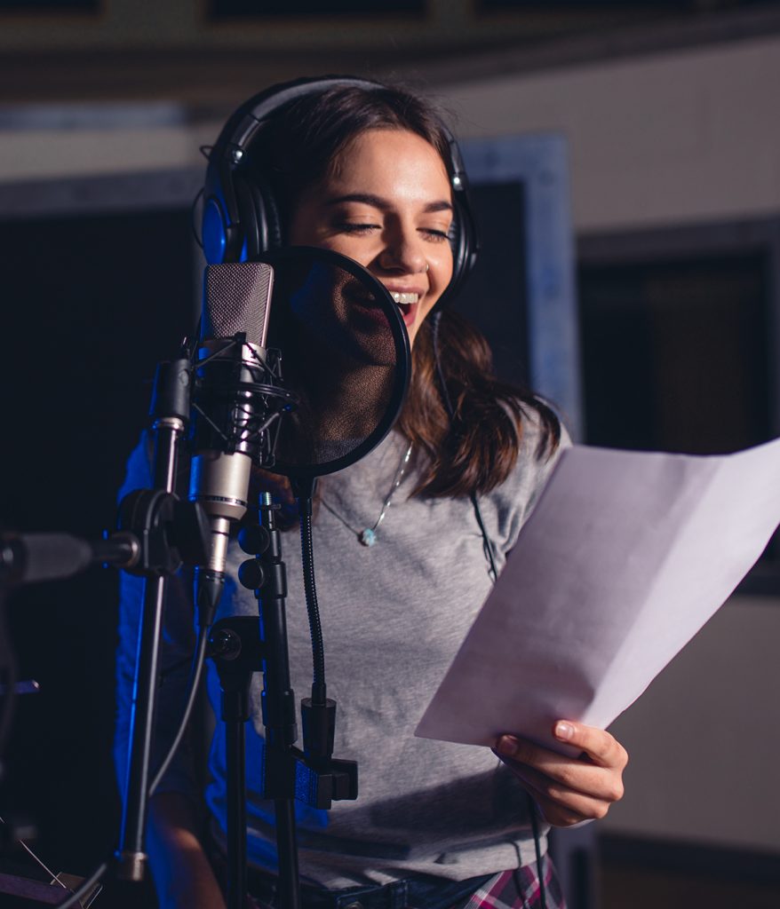 Young woman at a recording studio.