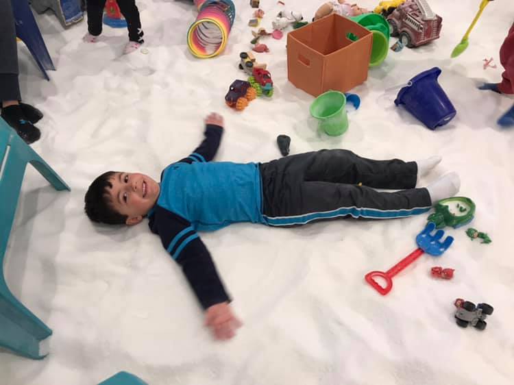 Young boy playing in the children salt suite.
